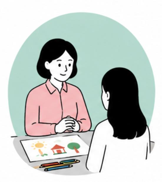 미술치료사가 한 사람의 그림을 함께 살펴보며 그림검사 해석 상담을 진행하는 장면